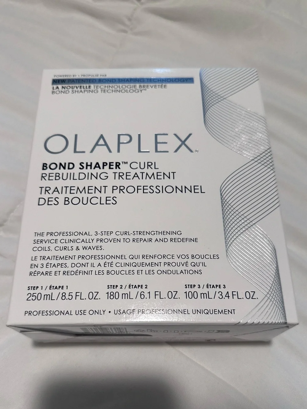 OLAPLEX Bond Shaper Curl Rebuilding Treatment – White and Blue Accents